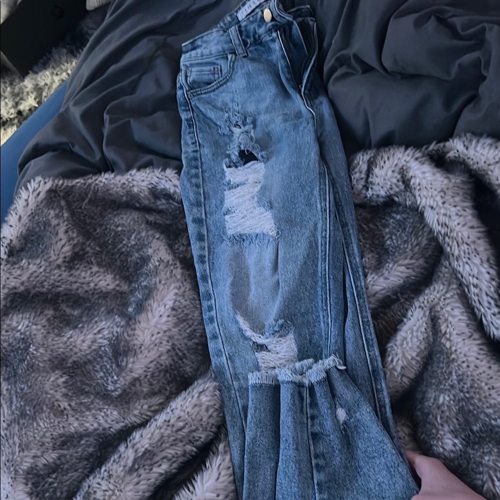 Distressed Blue Jeans